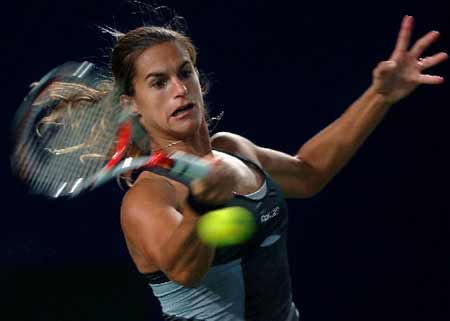 France's Amelie Mauresmo returns a shot against Slovakia's Dominika Cibulkova during women's singles first round match at the 2008 China Open in Beijing, capital of China Sept. 22, 2008. Mauresmo lose to Cibulkova 1-2. 