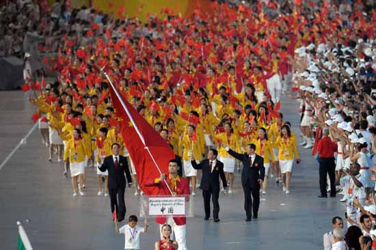 Members of the Olympic Delegation of China led by basketball star Yao Ming parade into the National Stadium at the opening ceremony of the Beijing 2008 Olympic Games in Beijing, China, Aug. 8, 2008. 