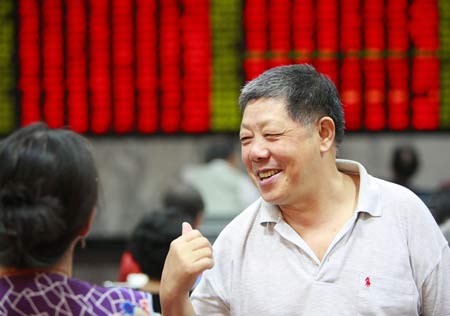 Chinese stocks jumped for a second day on Monday, gaining nearly 8 percent amid surging volume, as investor confidence got a further boost from several developments, including an easing on rules on share buy-backs and the massive U.S. rescue plan.[Xinhua] 