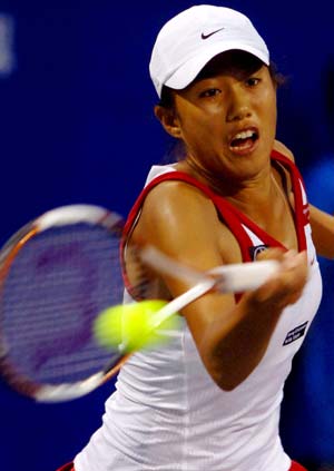 China's Zhang Shuai returns a ball during the women's singles first round match against France's Alize Cornet at the 2008 China Open in Beijing, capital of China, Sept. 23, 2008. Zhang Shuai lost 1-2. 