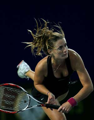 Iveta Benesova of Czech Republic returns a ball during the women's singles first round match against Russia's Anna Chakvetadze at the 2008 China Open in Beijing, capital of China, Sept. 23, 2008. Benesova lost 0-2. 