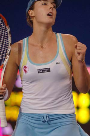 France's Alize Cornet reacts during the women's singles first round match against China's Zhang Shuai at the 2008 China Open in Beijing, capital of China, Sept. 23, 2008. Cornet won 2-1. 