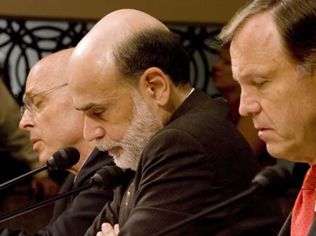 (L-R) US Treasury Secretary Henry Paulson, Federal Reserve Chairman Ben Bernanke, and Securities and Exchange Commission Chairman Christopher Cox testify before the Senate Banking Committee on Capitol Hill September 23, 2008. [Xinhua]