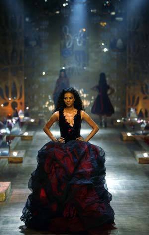 A model displays a creation as part of the Giorgio Armani Spring/Summer 2009 women's collection during Milan Fashion Week September 22, 2008.