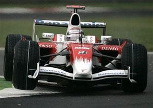 Italy's driver Jarno Trulli steers his Toyota during the free practice session ahead of Sunday's Formula one Grand Prix in Monza, Italy, Friday, Sept 12, 2008.[Antonio Calanni/AP]