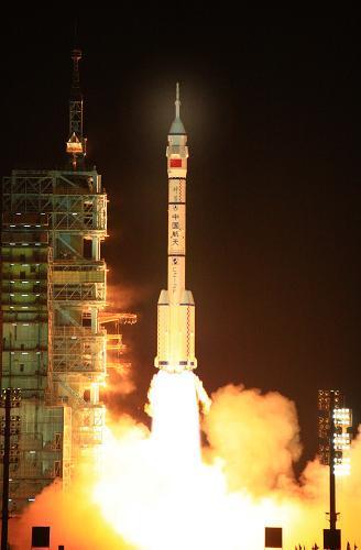China's manned spacecraft Shenzhou-VII blasts off at 9:10 PM. [Xinhua] 