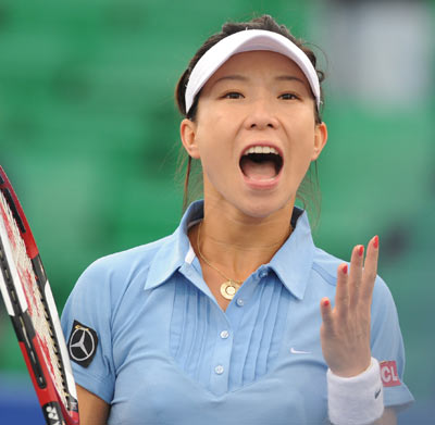 China's Zheng Jie celebrates a score during the women's singles first round match against Poland's Agnieszka Radwanska at the 2008 China Open in Beijing, capital of China, Sept. 24, 2008. Zheng Jie won 2-0.