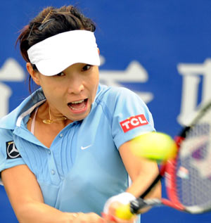 China's Zheng Jie returns a ball during the women's singles first round match against Poland's Agnieszka Radwanska at the 2008 China Open in Beijing, capital of China, Sept. 24, 2008. Zheng Jie won 2-0. 
