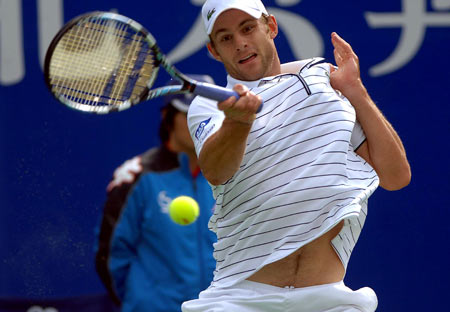 Andy Roddick of the United States returns a ball during the men's singles second round match against his compatriot Brendan Evans at the 2008 China Open in Beijing, capital of China, Sept. 25, 2008. Roddick won 2-0.