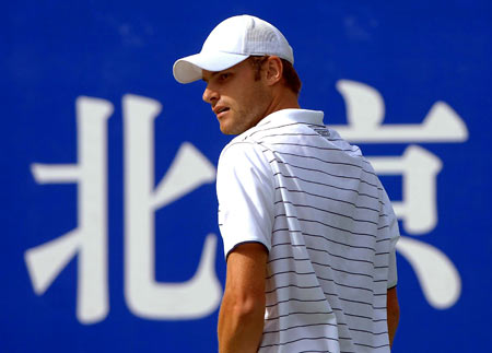 Andy Roddick of the United States reacts during the men's singles second round match against his compatriot Brendan Evans at the 2008 China Open in Beijing, capital of China, Sept. 25, 2008. Roddick won 2-0. 