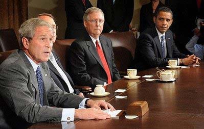 US President George W. Bush (L) makes remarks during a meeting with members of the Congress including the Presidential candidate Barack Obama (R) in the Cabinet Room at the White House in Washington, DC. [Chinadaily.com.cn]