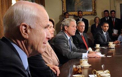 US President George W. Bush (C) makes remarks during a meeting with members of the Congress including the Presidential candidates John McCain (L) and Barack Obama (R) at the White House in Washington, DC. Senior US lawmakers emerged from financial crisis talks at the White House casting doubt about an imminent breakthrough on a Wall Street bailout, despite confident talk that a deal was in the works. [Chinadaily.com.cn]