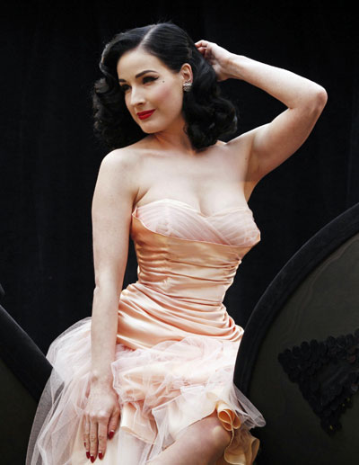 Burlesque dancer Dita Von Teese poses during a photocall to promote her new Wonderbra collection in London September 23, 2008.