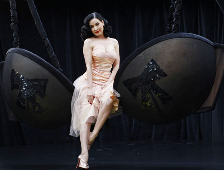 Burlesque dancer Dita Von Teese poses during a photocall to promote her new Wonderbra collection in London September 23, 2008. 