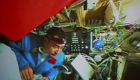 Chinese trio's first day of space adventure