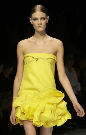 A model displays a creation as part of Versace Spring/Summer 2009 women's collection during Milan Fashion Week September 25, 2008.