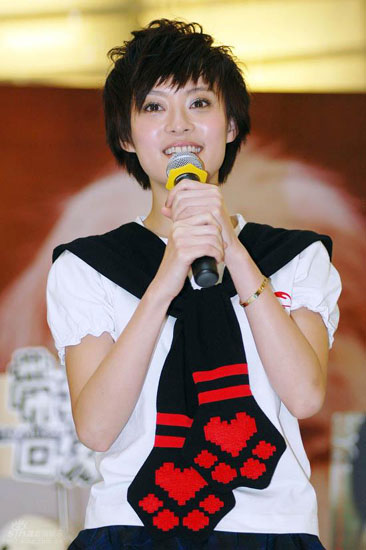 Chinese mainland actress Sun Li attends a photography exhibition for stray animals, titled a 'Take Me Home,' at the Xidan Joy City shopping center in Beijing on Friday, September 26, 2008. 