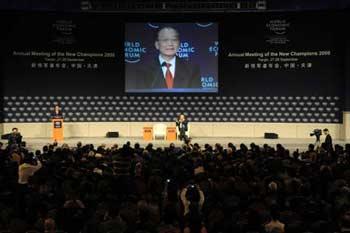 Chinese Premier Wen Jiabao delivers a speech at the opening ceremony of the second Annual Meeting of the New Champions organized by the World Economic Forum at Tianjin Binhai Convention and Exhibition Center in north China's Tianjin Municipality. [Ma Ping/Xinhua] 