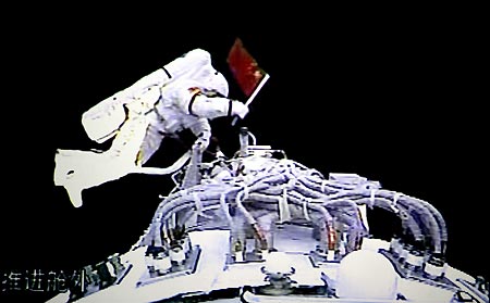 The video grab taken at the Beijing Space Command and Control Center on Sept. 27, 2008 shows Chinese taikonaut Zhai Zhigang working outside the orbit module of the Shenzhou-7 spacecraft during his spacewalk.