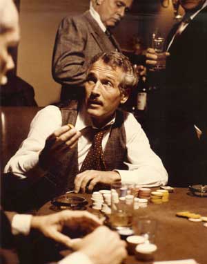 Actor Paul Newman who starred as con-artist Henry Gondorff in the Academy Award-winning film "The Sting," is shown here playing poker in a scene from the film in this undated file photograph.