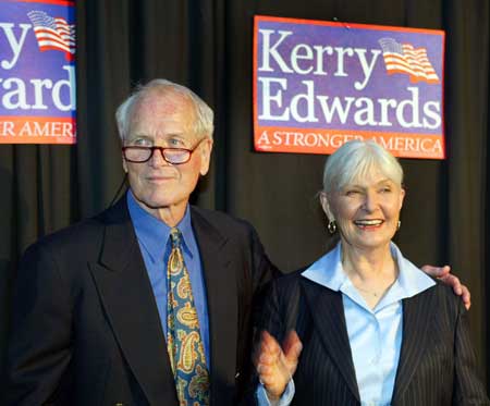 Paul Newman and his wife Joanne Woodward pose for photographers outside the "Kerry Edwards Victory 2004 New York Concert" at Radio City Music Hall in New York in this July 8, 2004 file photograph.