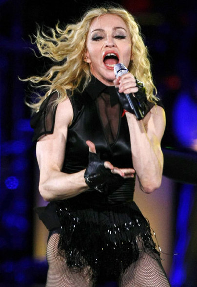 U.S. singer Madonna performs during her 'Sticky and Sweet' tour at the Olympic stadium in Athens September 27, 2008.