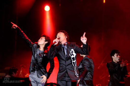 Eason Chan performs with dancers during his concert at the Beijing Worker's Stadium on Sunday, September 28, 2008.