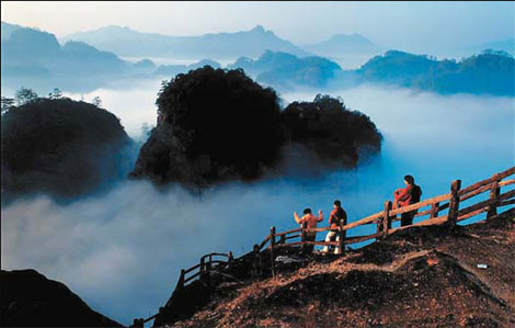 Travelers visit the Wuyi Mountains for spectacular natural scenery and fine oolong tea.