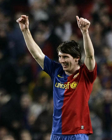 Barcelona's Lionel Messi celebrates his goal against Atletico de Madrid during their Spanish first division soccer match at Nou Camp stadium in Barcelona, October 4, 2008.