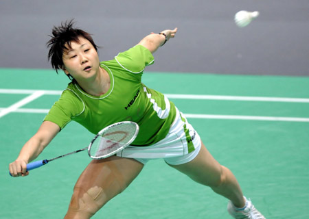 Zhou Mi of Hong Kong of China competes during the women's singles final against Julia Pei Xian Wong of Malaysia in Macau Grand Prix Gold 2008 in Macau, south China, Oct. 5, 2008. Zhou Mi won 2-0 (21-13, 21-19) and took the title.