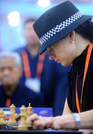 Alexandra Kosteniuk of Russia competes during the women's chess individual blitz against Antoaneta Stefanova of Bulgaria in the 1st World Mind Sports Games in Beijing, capital of China, Oct. 5, 2008.