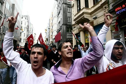 Turkish Nationalists shout slogans during a demonstration against the PKK Kurdish rebels&apos; attack on Turkey&apos;s Iraqi border on Friday in Istanbul on October 5, 2008. Thousands of people gathered across Turkey on October 5, 2008 for the funerals of 15 soldiers slain in a brazen Kurdish rebel attack on a border post, as the country&apos;s leadership vowed to crush the separatists. [Xinhua]