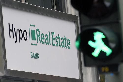 The logo of the German bank Hypo Real Estate in Berlin is photographed on September 29, 2008. Germany sealed a public-private rescue plan for the country's fourth biggest bank on October 5, 2008 as the government extended a blanket guarantee for all personal bank deposits to avert panic withdrawals. [Xinhua]