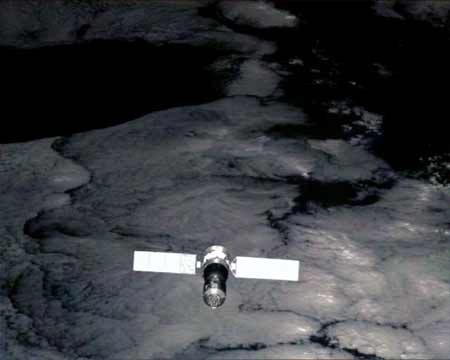 Picture released by China&apos;s manned space project on Oct. 5, 2008 shows the image of China&apos;s Shenzhou-7 spaceship, taken by a small monitoring satellite six minutes after it was released from the spaceship on Sept. 27, 2008. 