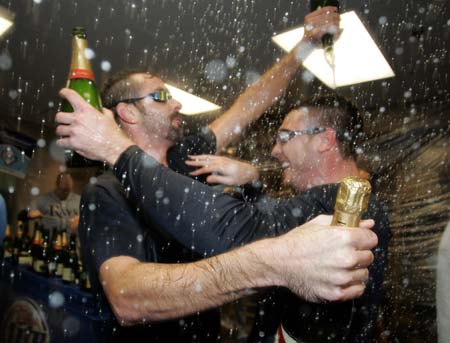 Scott Kazmir (R) and Trever Miller of the Tampa Bay Rays celebrate after winning Game 4 of their MLB American League Divisional Series playoff baseball against the Chicago White Sox in Chicago, October 6, 2008.