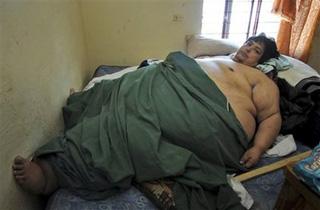 Jose Luis Garza, 47, lies on his bed in the town of Juarez, Mexico,Thursday, Oct. 2 , 2008.[Monica Rueda/AP Photo] 
