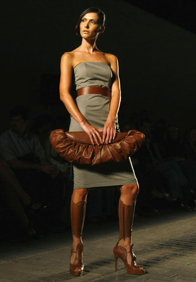  A model presents a creation by Elena Strongyliotou during the Athens' Fashion week October 9, 2008.