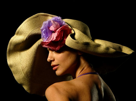 A model presents a hat by Greek designer Katerina Karoussos during the Athens' Fashion week October 9, 2008.