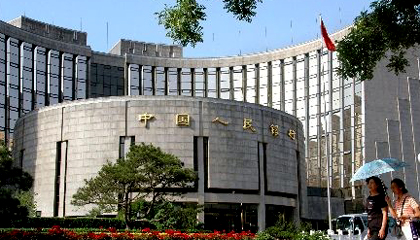 China's central bank on Friday said it will continue international cooperation to tackle the global financial crisis and maintain market stability.