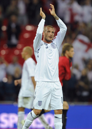 England's David Beckhma celebrates after the match against Kazakhstan at Wembley Stadium in London Oct. 11, 2008. 