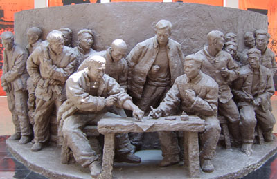 A sculpture exhibited in Xiaogang Memorial Hall. On November 24, 1978, 18 Xiaogang villagers made their handprints an a household-based contract to mark the beginning of China’s rural reform.