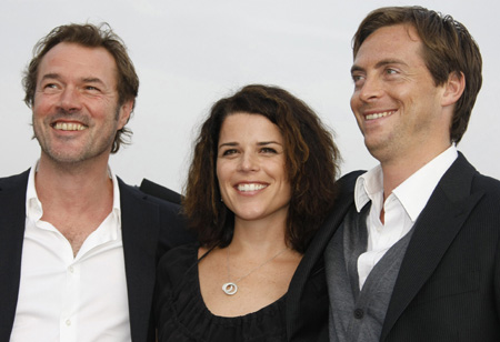 Cast members, Sebastian Koch of Germany, Neve Campbell of Canada and British actor Stephen Campbell Moore (L-R) pose during a photo-call in Cannes, southeastern France, October 13, 2008. Koch, Campbell and Campbell Moore are in Cannes to present " Sea Wolf" at the MIPCOM audiovisual trade fair which is the international film and programme market for TV, video, cable and satellite (MIPCOM).