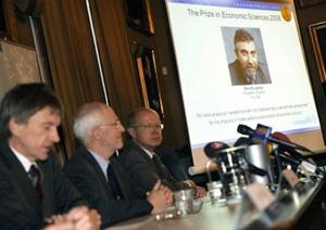Gunnar Oquist (centre), The Nobel Academy spokesman annouces US economist Paul Krugman as the 2008 Nobel Economics Prize laureate at the Royal Swedish Academy in Stockholm. Krugman is a prolific New York Times columnist and fierce critic of Washington's economic policies. 