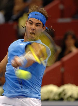Spain's Rafael Nadal returns a ball during a second round tennis match against Latvia's Ernests Gulbis of the Masters in Madrid of Spain, Oct. 14, 2008. Nadal won 2-1. [Chen Haitong/Xinhua]