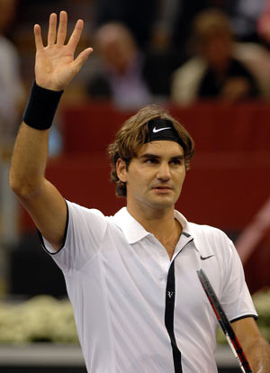 Roger Federer of Switzerland reacts after beating Radek Stepanek of the Czech Republic 6-3, 7-6, during a tennis match at the Madrid Masters in Madrid, Wednesday, Oct. 15, 2008. [Xinhua/Reuters]