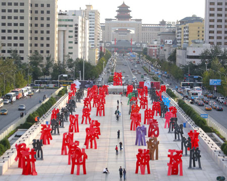 Sculptures inspired by Chinese characters stand on the China Millennium Monument Square in Beijing, October 15, 2008. A solo exhibition of 78 sculptures by Chinese artist Liu Yonggang started on Tuesday, China’s largest and longest modern sculpture exhibition. The show will last almost one month until November 12, 2008. [CFP] 