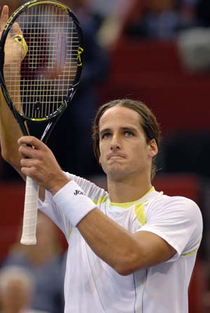 Spain's Feliciano Lopez reacts after he defeated Switzerland's Stanislas Wawrinka at the Madrid Masters Series tennis tournament in Madrid Oct. 16, 2008. [Xinhua/Reuters] 