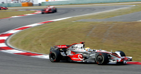 McLaren-Mercedes team's Lewis Hamilton of Britain drives during the F1 Chinese Grand Prix at the Shanghai International Circuit in Shanghai, east China, on Oct. 19, 2008.[Fan Jun/Xinhua] 
