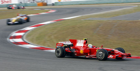Ferrari team's Felipe Massa of Brazil drives during the F1 Chinese Grand Prix at the Shanghai International Circuit in Shanghai, east China, on Oct. 19, 2008. Massa took the second place of the event.[Fan Jun/Xinhua] 