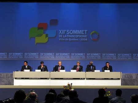 French Prime Minister Francois Fillon (1st R), secretary general of the International Organization of Francophonie (IOF) Abdou Diouf (2nd R) and Canadian Prime Minister Stephen Harper (3rd R) attend the press conference after the closing ceremony of the three-day summit of the IOF in the capital city of Canada's French-speaking Quebec province. Oct. 19, 2008. In their final declaration of the summit, the world leaders called for an international summit on the current global financial turmoil. (Xinhua/Yang Chuanlin) 